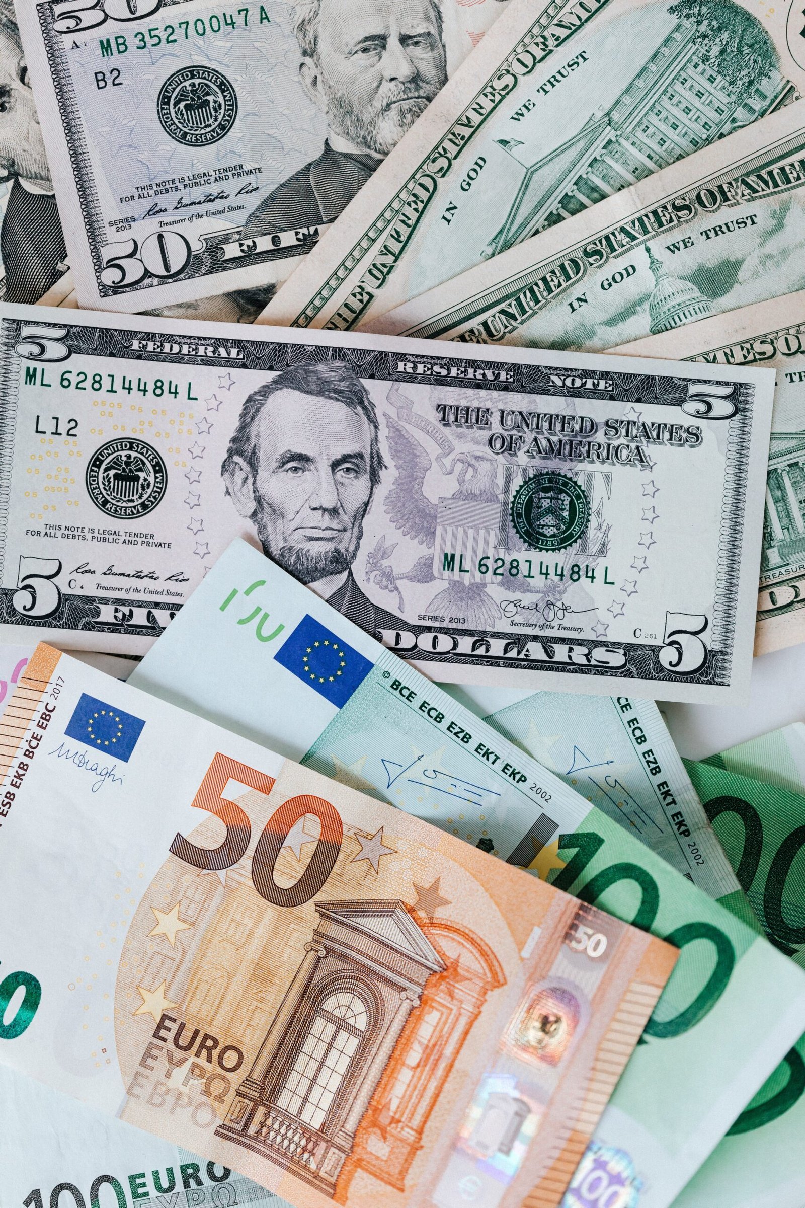 cash-money-finance-investment-american-dollars-euros-banknotes